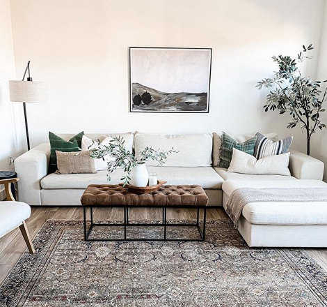 Neutral Living Room with Vintage Wall Art